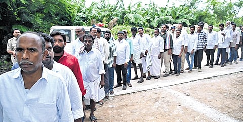 People stand in queue to cast their vote during Vontimitta ZPTC elections on Tuesday.