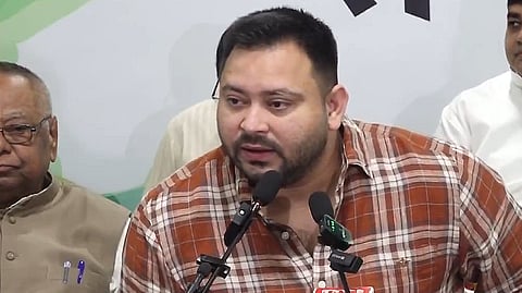 RJD leader and Bihar LoP Tejashwi Yadav speaks at a press briefing in Patna on Wednesday, Aug. 13, 2025.