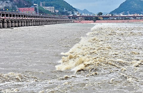 Authorities lift 70 Prakasam Barrage gates amid rising Krishna River floodwater, 1st warning issued downstream