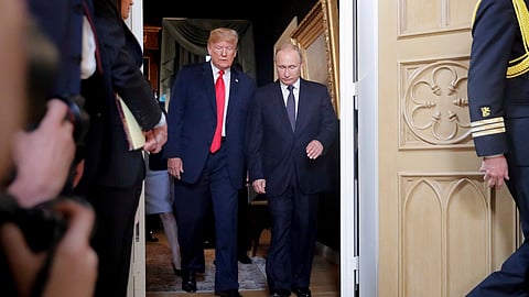 In this photo from July 16, 2018, US President Donald Trump (L) and Russian President Vladimir Putin (R) arrive for a one-on-one meeting at the Presidential Palace in Helsinki, Finland.
