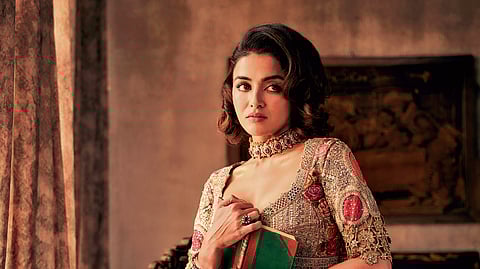 Woman alone, draped in time