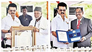 CM giving awards to KM Kader Mohideen (left) and V Narayanan 