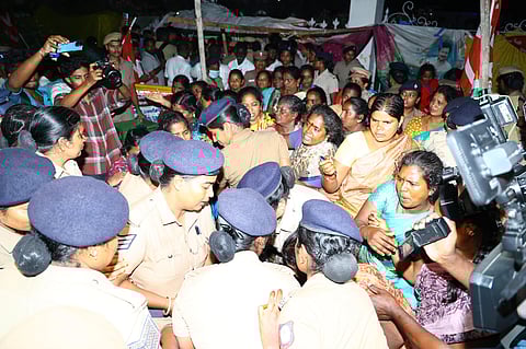 The protesters being forcefully evicted.