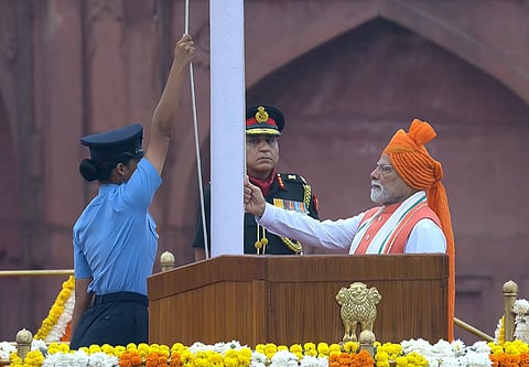 Prime Minister Narendra Modi hoists the national flag during the 79th Independence Day celebration at the Red Fort, in New Delhi, Friday, Aug. 15, 2025.