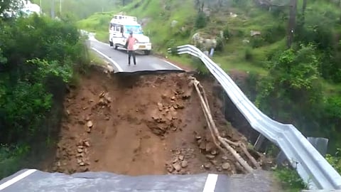 A road in the state collapsed due to incessant rains.