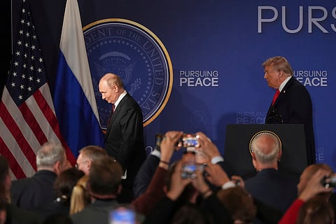 President Donald Trump, right, and Russia's President Vladimir Putin depart at the conclusion of a joint press conference at Joint Base Elmendorf-Richardson, Alaska, Friday, Aug. 15, 2025.