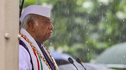 Congress President Mallikarjun Kharge addresses during the 79th Independence Day celebration, amid rain, in New Delhi.
