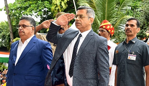 Chief Justice Aparesh Kumar Singh hoists the National Flag at the court premises as part of the Independence Day celebrations, in Hyderabad on Friday.