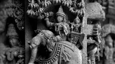 A carving of Indra with his consort Indrani mounting Airavat, as seen in a carving at the Keshava Temple, Somanathapura, Mysuru