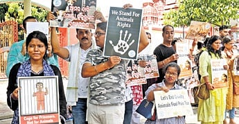Members of People for Animals staged a protest in Bhubaneswar.