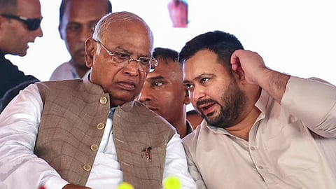 In this image released by @INCIndia via X on Aug. 17, 2025, Congress President Mallikarjun Kharge and LoP in the Bihar Assembly and RJD leader Tejashwi Yadav during the 'Voter Adhikar Yatra', in Sasaram.