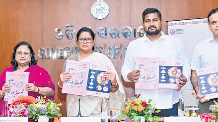 Deputy CM Pravati Parida, Higher Education minister Suryabanshi Suraj and others during the release of DECE course in Odia, on Monday 