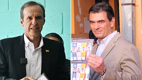 Former Bolivian president and presidential candidate for the "Alianza Libre" (Free Alliance) coalition, Jorge "Tuto" Quiroga Ramirez (L), Bolivia's presidential candidate for the Christian Democratic Party (PDC), Rodrigo Paz, voting at a polling station