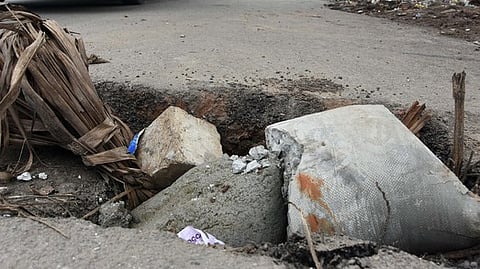 Bad condition of the 80 feet road at Chandra Layout poses a danger to motorists in Bengaluru