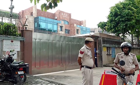 Police personnel outside Delhi Public School (DPS) that received a bomb threat on Monday, at Dwarka, in New Delhi, Monday, Aug. 18, 2025.