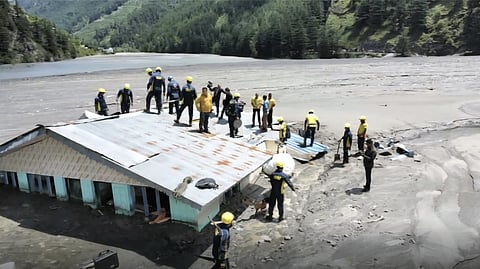  Fourteen days have elapsed since the disaster, and the grim search continues for dozens still missing.