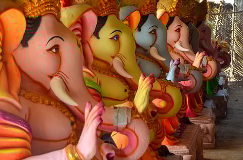 Rows of brightly painted Vinayagar (Ganesha) idols nearing completion ahead of Vinayagar Chaturthi celebrations.