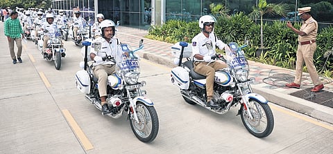 Traffic cops drive the newly launched patrolling bikes at the ICCC in Hyderabad on Thursday 