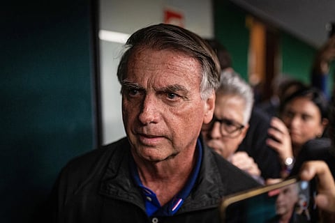 Jair Bolsonaro, Brazil's former president, departs meetings at the National Congress in Brasilia, Brazil, on July 21,2025