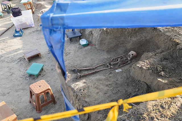 A number identifies a human skeleton exhumed from a mass grave in Chemmani, Sri Lanka, Aug. 5, 2025.