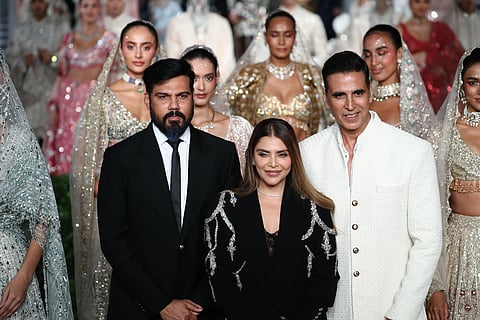 (L-R) Shane and Falguni Peacock with actor Akshay Kumar at India Couture Week in Delhi