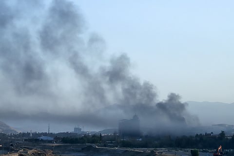 Smoke billows over a neighbourhood of Sulaimaniyah, east of the autonomous Kurdistan region of Iraq.
