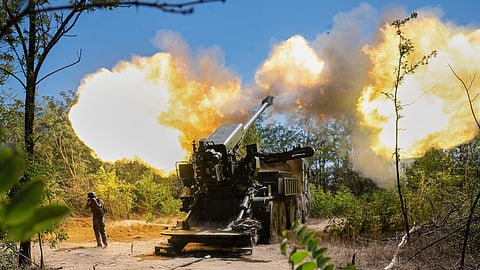 Ukrainian servicemen of the 44th artillery brigade fire a 2s22 Bohdana self-propelled howitzer towards Russian positions at the frontline in the Zaporizhzhia region, Ukraine, Wednesday, Aug. 20, 2025.