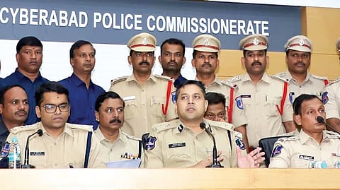 Cyberabad Police Commissioner Avinash Mohanty addresses a press meet on Saturday; (left) the cricket bat that was central to the murder