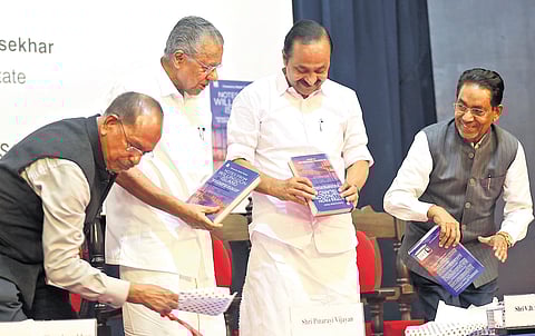Chief Minister Pinarayi Vijayan releasing ‘Notes From Willingdon Island’, authored by former Cochin Port Trust Chairman N Ramachandran (extreme left). Leader of Opposition V D Satheesan and K P R Nair, MD, Konark Publishers, are also seen 
