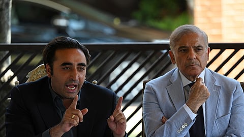 Pakistan Peoples Party leader Bilawal Bhutto Zardari (L) with Pakistan Prime Minister and Pakistan Muslim League (Nawaz) leader Shehbaz Sharif (R) speak during a press conference in Islamabad.
