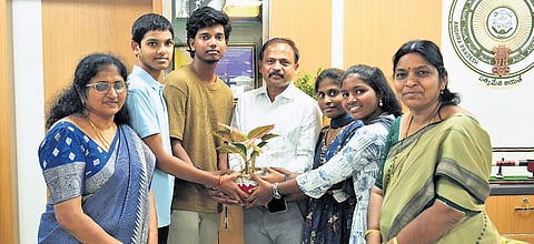 The government school students, who attended the prestigious Sakura Science Exchange Programme, met Samagra Shiksha State PD B Srinivasa Rao 