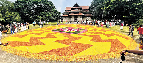 A 60-feet Athapookkalam made by over 150 members of Sayahna Souhruda Kootayma using 1,500kg of flowers  at Thekkinkad Maidan at the Thekke Gopura Nada of Vadakkumnathan Temple on Tuesday 
