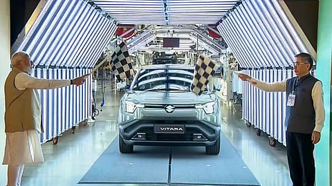 Prime Minister Narendra Modi flags off Maruti Suzuki's first electric vehicle e-Vitara from Hansalpur manufacturing facility, Gujarat.