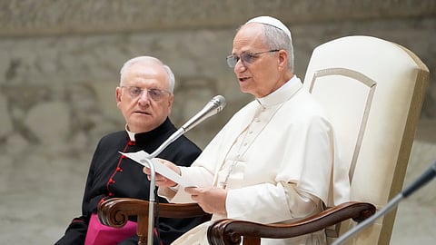 Pope Leo XIV reads his message during the weekly general audience at the Vatican, Wednesday, Aug. 27, 2025.