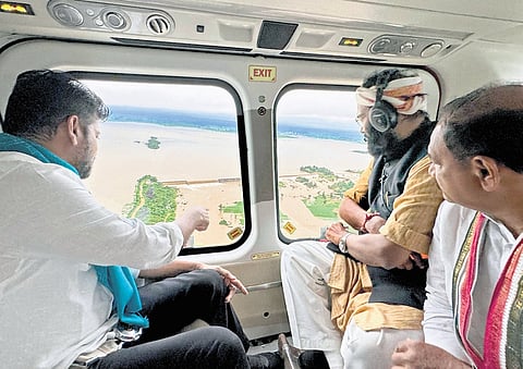 CM A Revanth Reddy, along with Minister N Uttam Kumar Reddy and TPCC chief Mahesh Kumar Goud, conducts aerial survey of flood-hit areas on Thursday