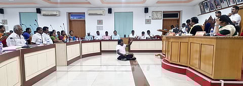 Councillor of Ward 57 staged a sit-in protest inside the meeting hall, condemning the Mayor for the corporation's revenue loss