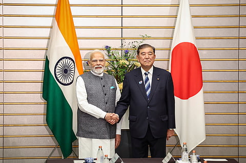 Prime Minister Narendra Modi, left, shakes hands with Japan's Prime Minister Shigeru Ishiba during a meeting in Tokyo, Friday Aug. 29, 2025.