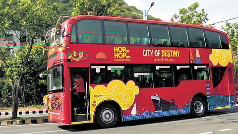Newly launched ‘Hop-on Hop-Off’ bus on a ride across the RK Beach stretch in Visakhapatnam on Friday.