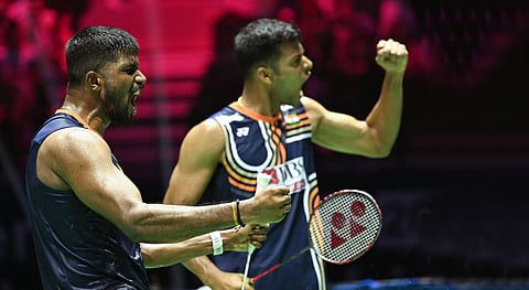 Satwiksairaj Rankireddy (L) and Chirag Shetty rejoice after their win on Friday