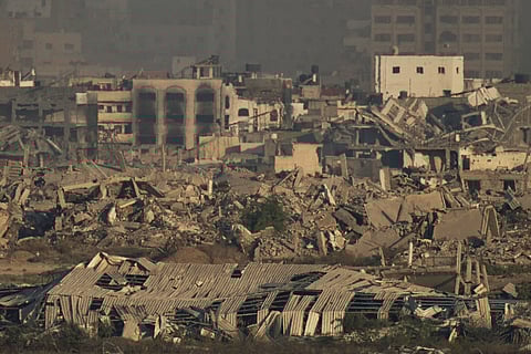 Buildings that were destroyed during the Israeli ground and air operations stand in the northern Gaza Strip as seen from southern Israel, Saturday, Aug. 30, 2025.