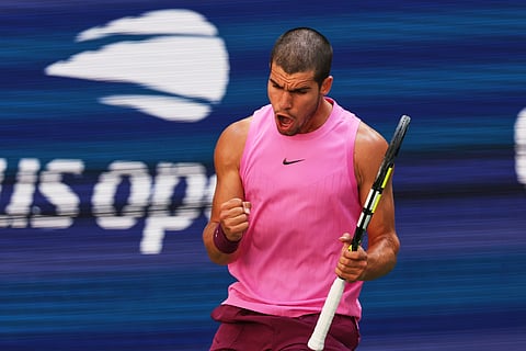 Carlos Alcaraz, of Spain, reacts during his match against Arthur Rinderknech, of France, in the fourth round of the U.S. Open tennis championships, Sunday, Aug. 31, 2025, in New York.