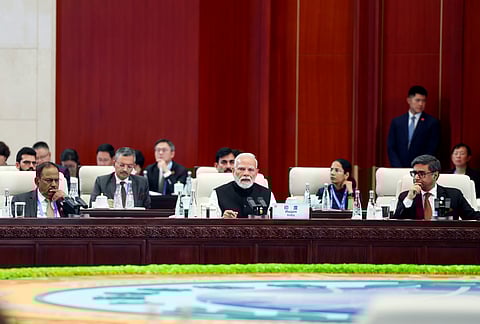  Prime Minister Narendra Modi delivers India's statement at the Shanghai Cooperation Council (SCO) Members Session in Tianjin, China on Monday. National Security Advisor (NSA) Ajit Doval and Foreign Secretary Vikram Misri also present. 