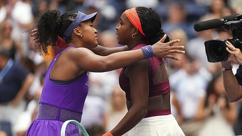 Naomi Osaka, left, of Japan, greets Coco Gauff, of the United States, after their match in the fourth round of the US Open tennis championships, Monday, September 1, 2025, in New York.