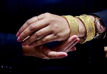 Gold, silver shine at record highs as weak dollar and Fed cut hopes boost demand