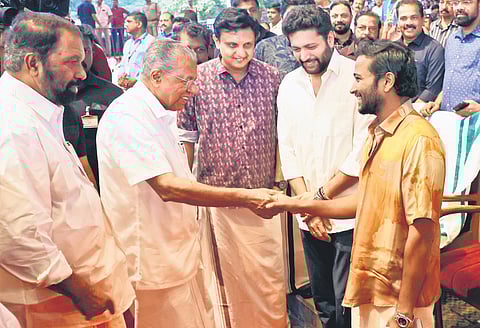 Chief Minister Pinarayi Vijayan greets actor Basil Joseph during the inaugural function of the week-long Onam celebrations at Nishagandhi auditorium in Thiruvananthapuram on Wednesday. Ministers V Sivankutty, Mohamed Riyas and actor Ravi Mohan are also seen 