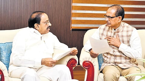 Minister Thummala Nageswara Rao with Union Agriculture Minister Shivraj Singh Chouhan at the latter’s residence in New Delhi on Wednesday