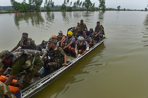 Kapurthala: Army personnel during a rescue and evacuation operation at a flood-affected village, in Kapurthala district, Punjab.