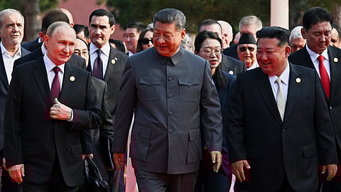 From left, Russian President Vladimir Putin, Chinese President Xi Jinping and North Korean leader Kim Jong Un arrive at a military parade to commemorate the 80th anniversary of Japan's World War II surrender in Beijing, China, Wednesday, Sept. 3, 2025.