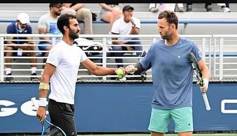 India's Yuki Bhambri (L) and New Zealand's Michael Venus upset 11th seeds Nikola Mektic and Rajeev Ram 6-3, 6-7(8), 6-3 in a quarterfinal clash on Court 17 to continue their impressive run on Wednesday.