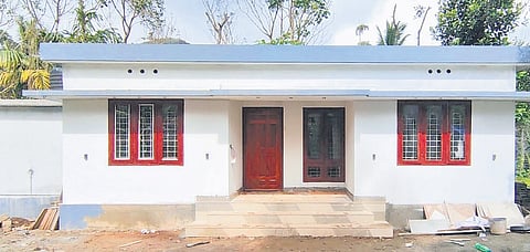 Idukki teacher builds house for tribal students; hands over keys on Thiruvonam